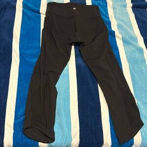 Black lululemon leggings, mesh on the sides